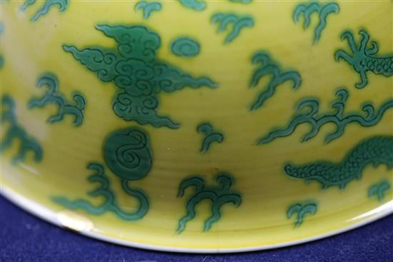 A Chinese yellow and green enamelled dragon bowl, Qianlong seal mark and of the period (1736-95) D. 15.5cm, faults